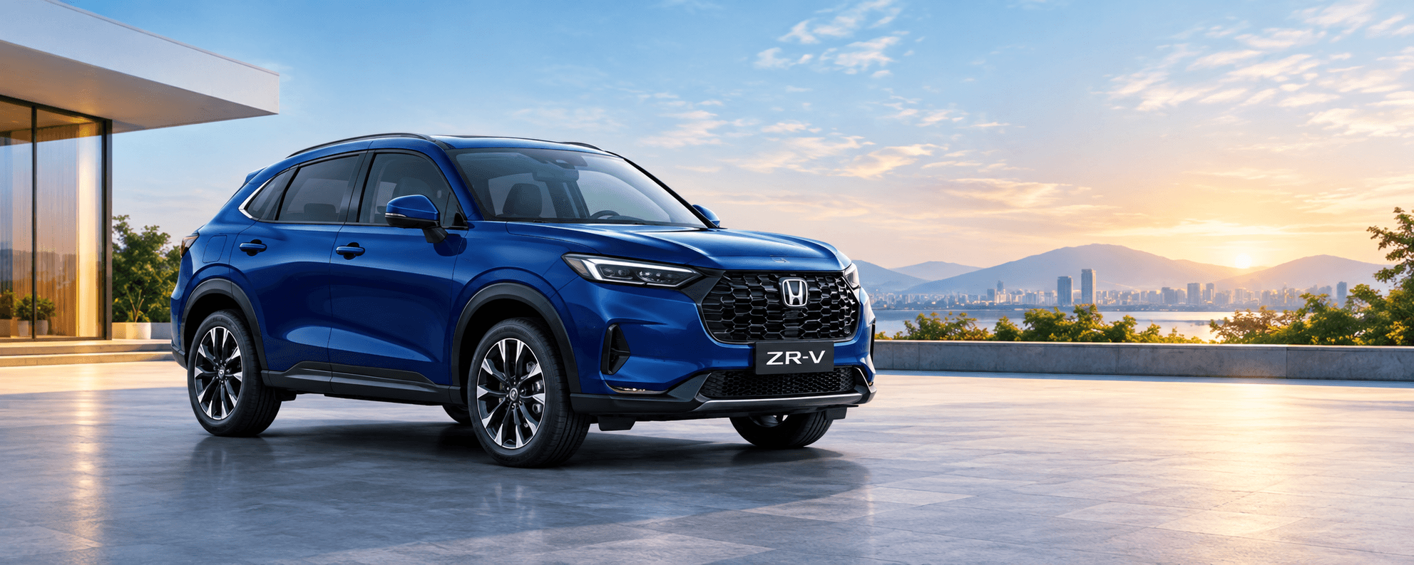 Honda ZR-V in blue at sunset beside a waterfront home